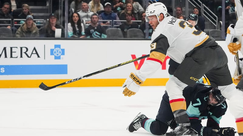 Seattle Kraken right wing Jordan Eberle (7) looks on after falling over while colliding with...