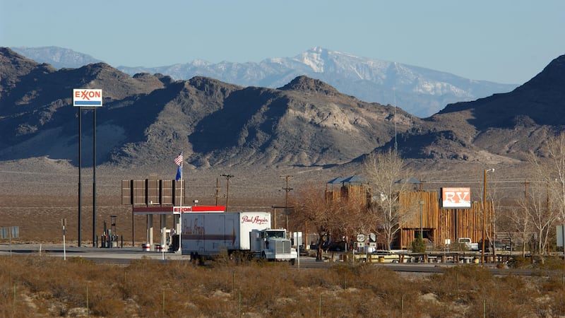 400728 06: A truck travels through he tiny community of Amargosa Valley February 7, 2002 which...