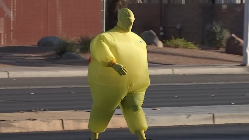 A Las Vegas police officer dressed up to highlight pedestrian safety on Tuesday, Oct. 29, 2024.