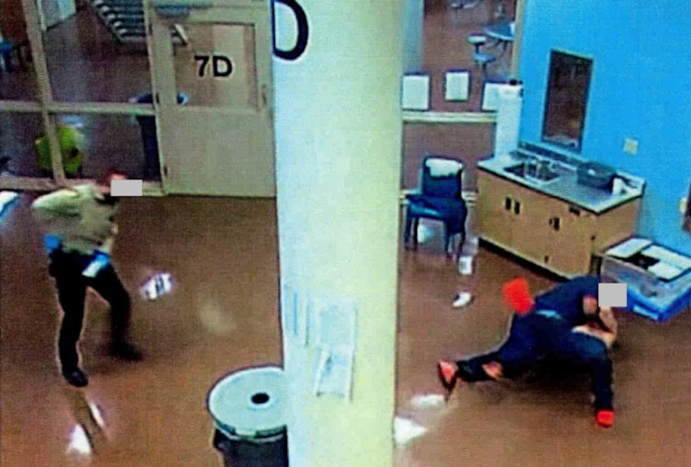 Surveillance photos show Duane "Keffe D" Davis engaged in a fight with another inmate at Clark...
