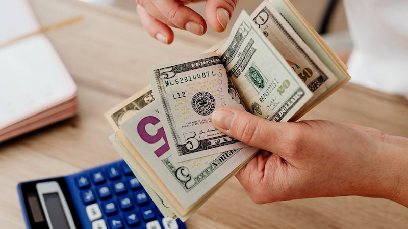 Flipping through money