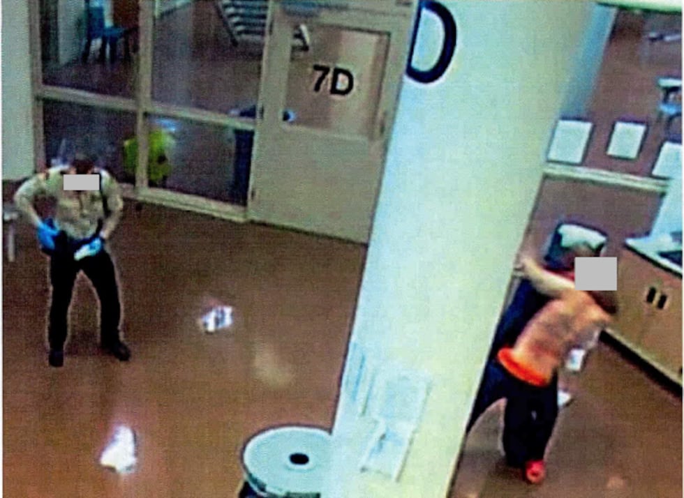 Surveillance photos show Duane "Keffe D" Davis engaged in a fight with another inmate at Clark...