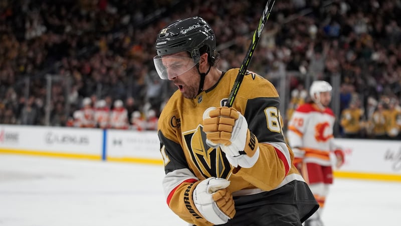 Vegas Golden Knights right wing Mark Stone (61) celebrates after scoring against the Calgary...