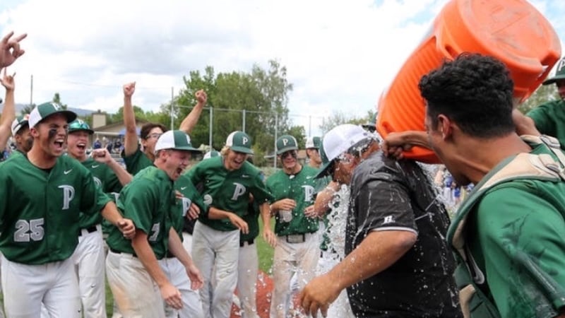 Students of a former Las Vegas teacher and coach rallied around him to show support as he...