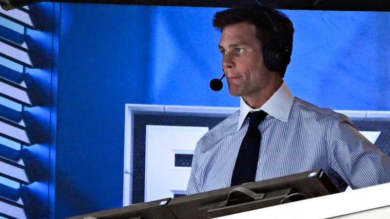 FILE - Former NFL quarterback Tom Brady looks on from the broadcast booth during the second...