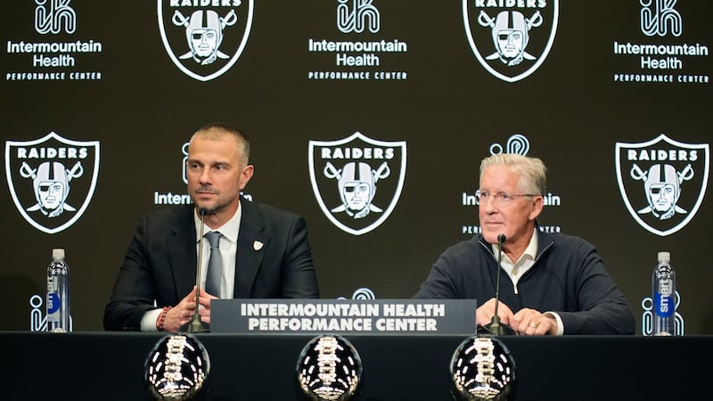 Las Vegas Raiders general manager John Spytek, left, and head coach Pete Carroll attend a news...
