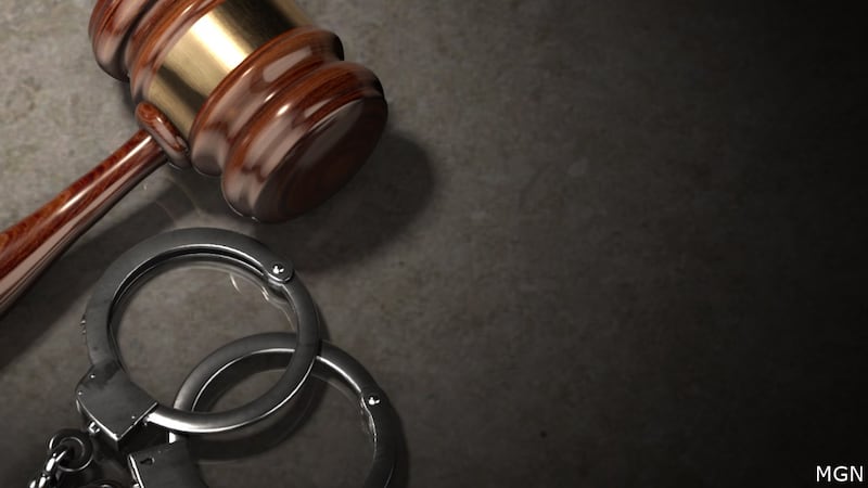 A gavel and handcuffs