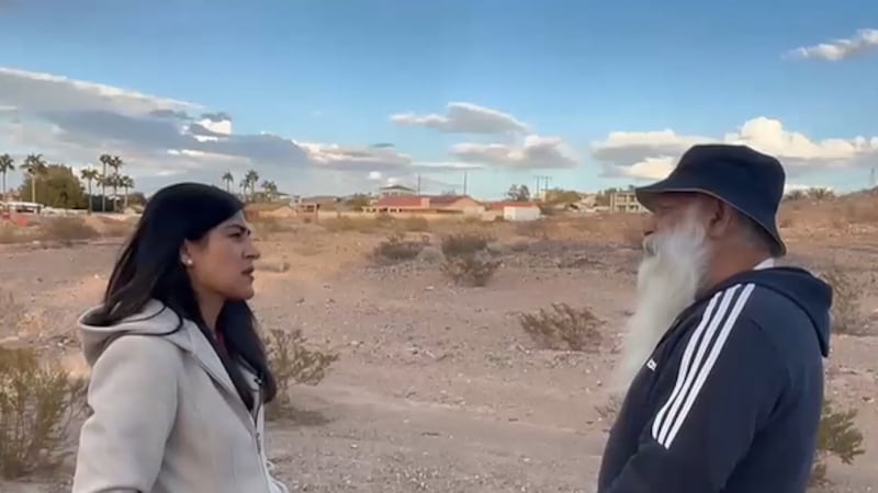 FOX5's Victoria Saha with religious leader Baba Anal.