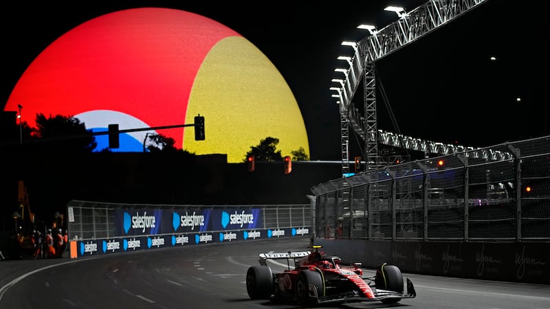 Ferrari driver Carlos Sainz, of Spain, races during the final practice session for the Formula...