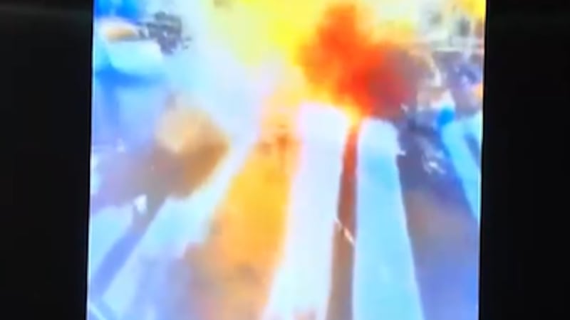One person is dead and seven others are injured after a car exploded near the Trump...
