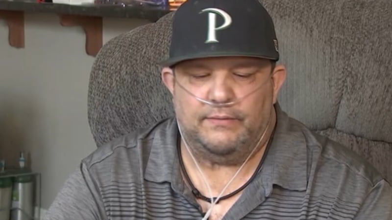 Students of a former Las Vegas teacher and coach rallied around him to show support as he...
