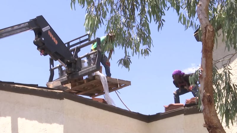 Roofers in Las Vegas have to work during extreme heat