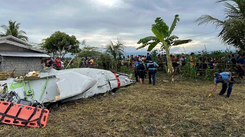 Wreckage of airplane in a rice field in Maguindanao del Sur province, Philippines, after...