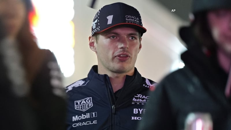 Red Bull driver Max Verstappen, of the Netherlands, heads to a media interview ahead of the...