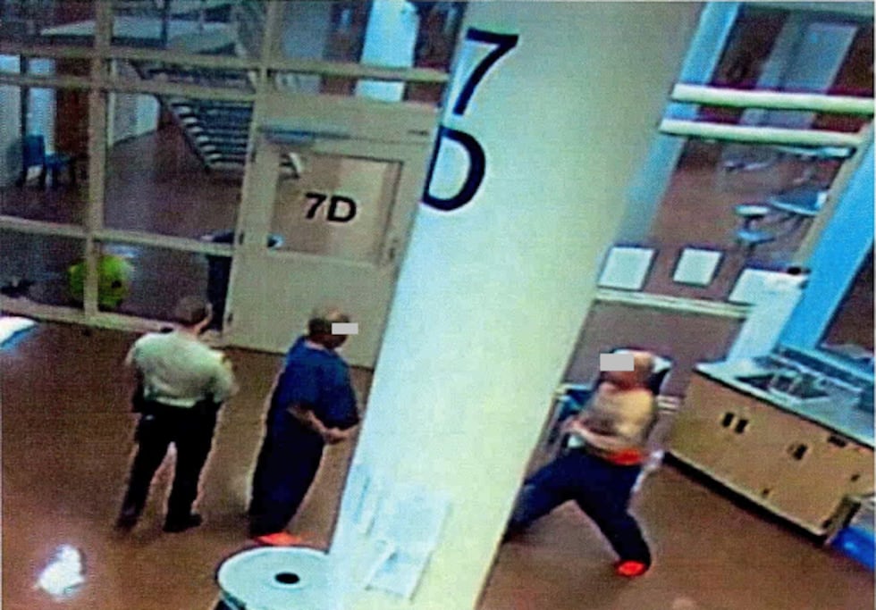 Surveillance photos show Duane "Keffe D" Davis engaged in a fight with another inmate at Clark...