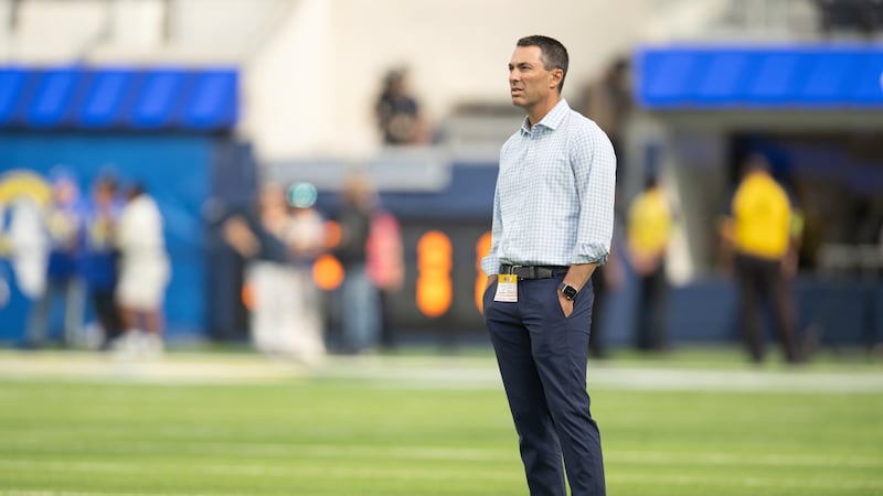 Los Angeles Chargers general manager Tom Telesco watches his players before an NFL preseason...