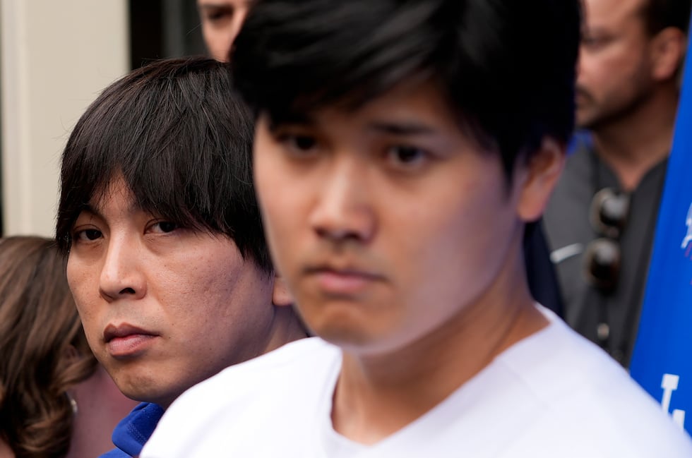 FILE - Interpreter Ippei Mizuhara, left, stands next to Los Angeles Dodgers player Shohei...